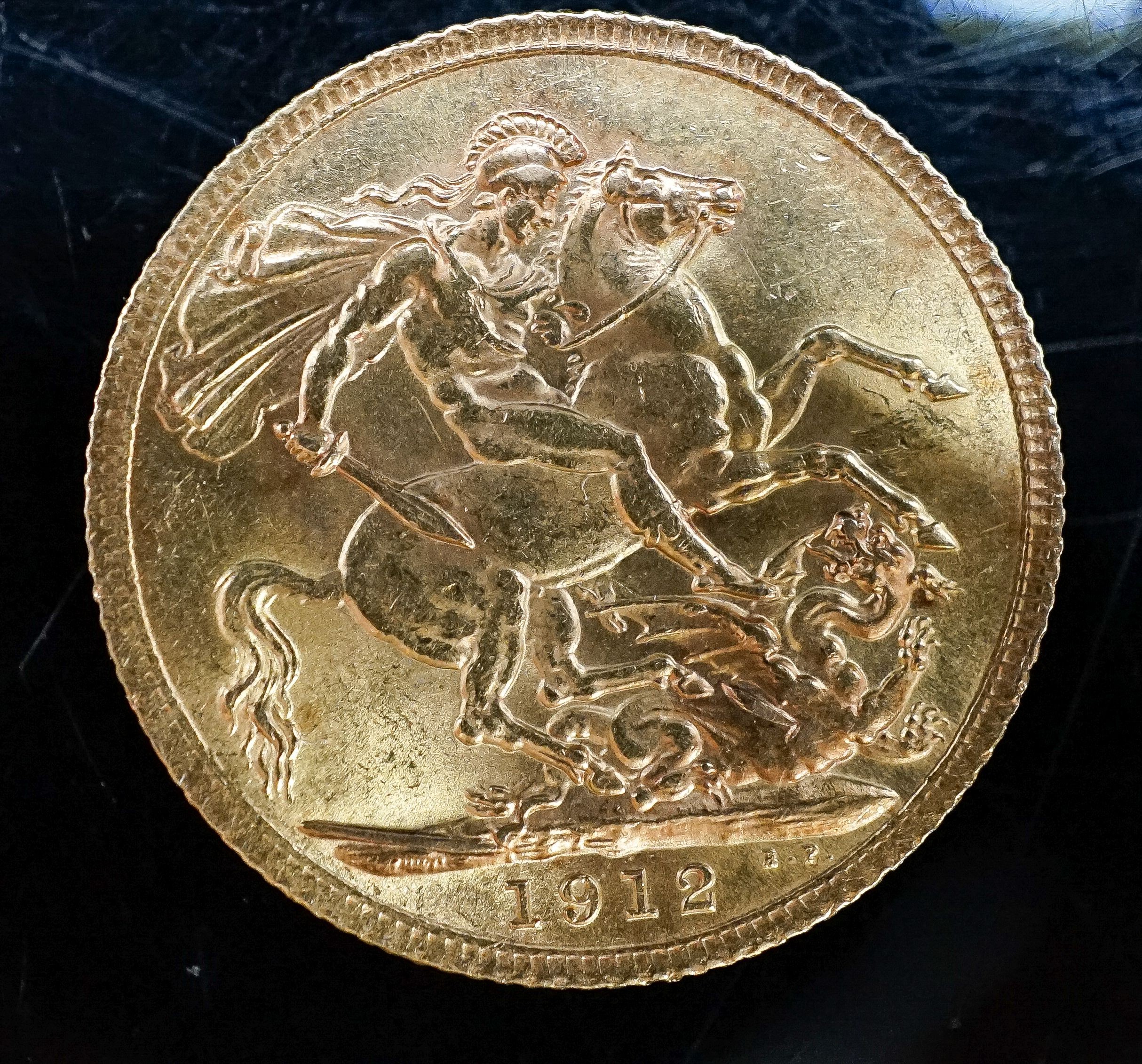 A George V 1912 gold sovereign.